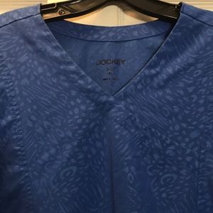 Solid blue short sleeve scrub top